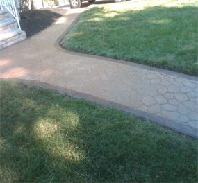 Stamped concrete walkway, concrete path ideas, concrete walkway designs, decorative concrete, stamped concrete NJ, concrete walkway repair, modern walkway designs, NJ masonry contractor, concrete patio installation, outdoor concrete ideas, stamped concrete cost, front yard walkway ideas, durable walkways, colored concrete, walkway lighting, concrete landscaping NJ.